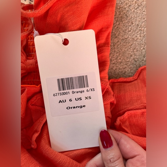 NWT Bright Orange Ruffle Romper, Size XS - Picture 9 of 10